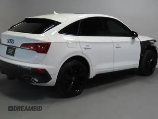 2023 Audi SQ5 Sportback Premium Plus с VIN WA124AFY1P2038636, выставлен на аукционе Copart как лот 60932975 с пробегом 27 258 миль миль и Списание • Salvage title. История ставок и продаж доступна на DreamBid. Изображение 3.