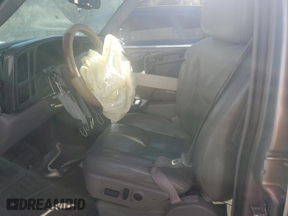 2005 GMC Yukon Denali z VIN 1GKEK63U35J228887, wystawiony jako Copart lot #68141304 z przebiegiem 238 024 mil mil oraz Szkoda całkowita • Salvage title. Historia ofert i sprzedaży dostępna na DreamBid. Obrazek 7.