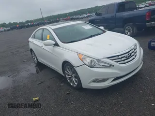 2013 Hyundai Sonata Limited z VIN 5NPEC4AC5DH761872, wystawiony jako IAAI lot #42380247 z przebiegiem 97 527 mil mil oraz . Historia ofert i sprzedaży dostępna na DreamBid. Obrazek 1.