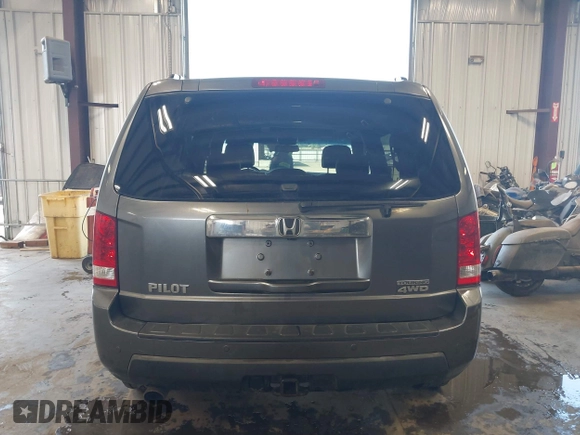2010 Honda Pilot Touring with VIN 5FNYF4H89AB026005, listed as a IAAI auction lot 42118607 with 182,689 mi miles. Bid and sale history available at carsss.com. Image 16.