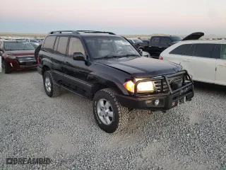 2003 Toyota Land Cruiser with VIN JTEHT05J132049479, listed as a Copart auction lot 74533464 with 218,413 mi miles and Salvage Title. Bid and sale history available at carsss.com. Image 4.