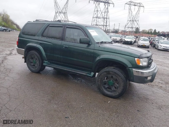 2000 Toyota 4Runner SR5 with VIN JT3HN86R9Y0294975, listed as a IAAI auction lot 41985007 with 218,761 mi miles. Bid and sale history available at carsss.com. Image 1.