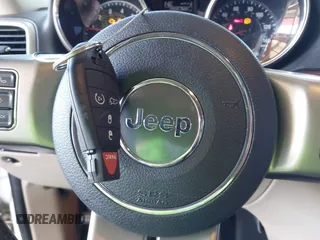 2012 Jeep Grand Cherokee Limited with VIN 1C4RJEBG7CC227488, listed as a IAAI auction lot 41881061 with 185,327 mi miles. Bid and sale history available at carsss.com. Image 11.