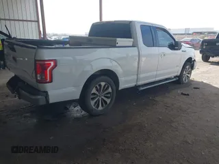 2015 Ford F-150 XL with VIN 1FTEX1CP0FKE84653, listed as a IAAI auction lot 41794451 with 156,552 mi miles. Bid and sale history available at carsss.com. Image 4.