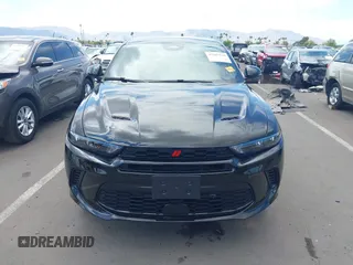 2024 Dodge Hornet GT z VIN ZACNDFAN8R3A14928, wystawiony jako IAAI lot #42387134 z przebiegiem 27 254 mil mil oraz . Historia ofert i sprzedaży dostępna na DreamBid. Obrazek 12.