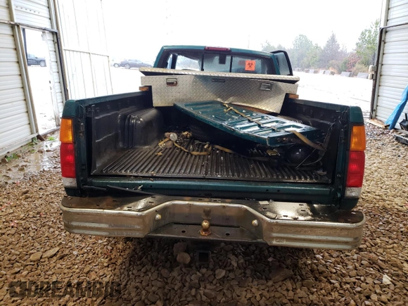 1997 Nissan Frontier XE with VIN 1N6SD16Y2VC338776, listed as a Copart auction lot 45020595 with 243,030 mi miles and Salvage title. Bid and sale history available at DreamBid. Image 6.