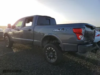2019 Nissan Titan XD SV with VIN 1N6BA1F4XKN532266, listed as a Copart auction lot 77098244 with 105,965 mi miles and Salvage Title. Bid and sale history available at carsss.com. Image 2.