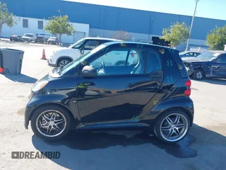 2014 Smart fortwo Pure with VIN WMEEJ3BA0EK740736, listed as a IAAI auction lot 41446173 with 68,530 mi miles and . Bid and sale history available at DreamBid. Image 13.