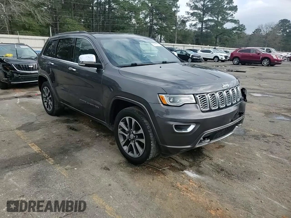 2017 Jeep Grand Cherokee Overland with VIN 1C4RJECG2HC903366, listed as a Copart auction lot 44140155 with 102,459 mi miles and Salvage title. Bid and sale history available at DreamBid. Image 12.