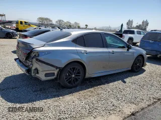 2025 Toyota Camry LE with VIN 4T1DAACK2SU517728, listed as a Copart auction lot 52567455 with 28,385 mi miles and Salvage Title. Bid and sale history available at DreamBid. Image 3.
