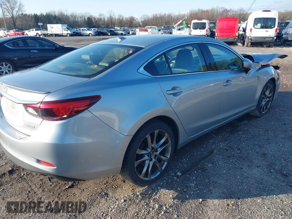2017 Mazda 6 Grand Touring with VIN JM1GL1W50H1132261, listed as a IAAI auction lot 41930610 with 54,431 mi miles and . Bid and sale history available at DreamBid. Image 4.