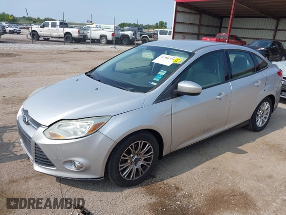 2012 Ford Focus SE with VIN 1FAHP3F22CL115653, listed as a IAAI auction lot 42380304 with 192,639 mi miles and . Bid and sale history available at DreamBid. Image 2.