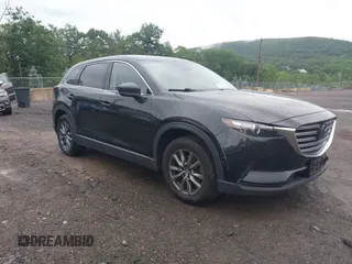 2020 Mazda CX-9 Touring z VIN JM3TCBCY5L0422262, wystawiony jako IAAI lot #42456246 z przebiegiem 69 211 mil mil oraz . Historia ofert i sprzedaży dostępna na DreamBid. Obrazek 1.