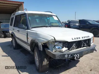 2000 Land Rover Discovery Cloth z VIN SALTY124XYA262828, wystawiony jako IAAI lot #41769729 z przebiegiem 215 711 mil mil oraz . Historia ofert i sprzedaży dostępna na DreamBid. Obrazek 1.
