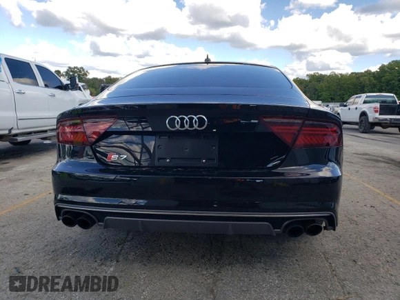 2018 Audi S7 Prestige z VIN WAU2FAFC1JN090694, wystawiony jako Copart lot #72414024 z przebiegiem 71 184 mil mil oraz Szkody całkowita. Historia ofert i sprzedaży dostępna na DreamBid. Obrazek 6.