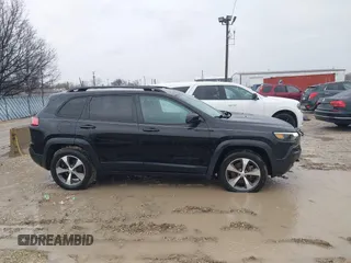 2020 Jeep Cherokee Latitude with VIN 1C4PJMCX9LD584410, listed as a IAAI auction lot 41710754 with 73,325 mi miles. Bid and sale history available at carsss.com. Image 13.