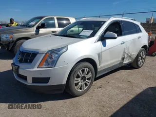 2012 Cadillac SRX Luxury Collection with VIN 3GYFNAE37CS597594, listed as a IAAI auction lot 41647807 with 193,836 mi miles and . Bid and sale history available at carsss.com. Image 2.