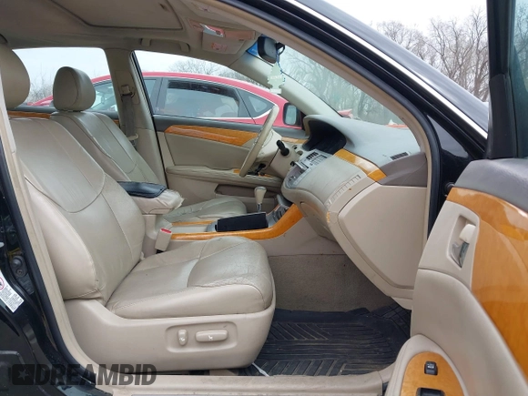 2006 Toyota Avalon XL with VIN 4T1BK36B66U096128, listed as a IAAI auction lot 41813449 with 213,705 mi miles. Bid and sale history available at carsss.com. Image 5.