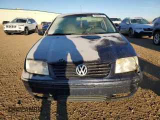 2000 Volkswagen Jetta GLS z VIN 3VWSA29M7YM057356, wystawiony jako Copart lot #76960844 z przebiegiem 299 410 mil mil oraz Szkoda całkowita • Salvage title. Historia ofert i sprzedaży dostępna na DreamBid. Obrazek 5.