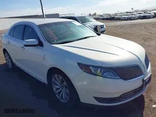 2013 Lincoln MKS with VIN 1LNHL9DK8DG602339, listed as a IAAI auction lot 41670244 with 186,411 mi miles. Bid and sale history available at carsss.com. Image 1.