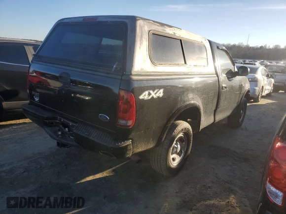 2002 Ford F-150 XL with VIN 1FTRF18232NA58109, listed as a Copart auction lot 88929065 with 148,228 mi miles and Salvage title. Bid and sale history available at DreamBid. Image 3.