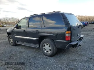 2006 GMC Yukon SLT with VIN 1GKEK13T46R113955, listed as a Copart auction lot 52398525 with 214,897 mi miles and Salvage Title. Bid and sale history available at carsss.com. Image 2.