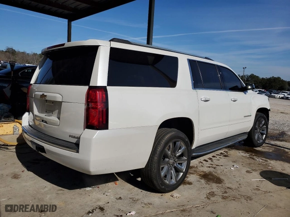 2020 Chevrolet Suburban Premier with VIN 1GNSKJKC0LR276184, listed as a Copart auction lot 88840565 with 87,563 mi miles and Salvage Title. Bid and sale history available at carsss.com. Image 3.