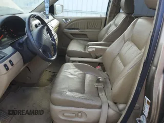 2009 Honda Odyssey EX-L with VIN 5FNRL38649B413532, listed as a Copart auction lot 79867014 with 308,701 mi miles and Salvage Title. Bid and sale history available at DreamBid. Image 7.