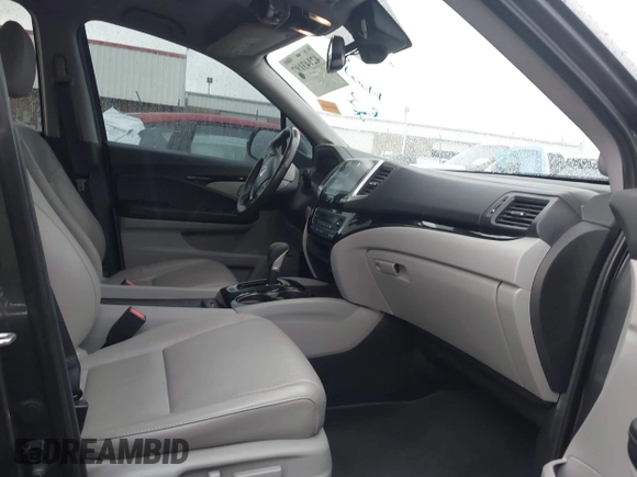 2018 Honda Ridgeline RTL-E with VIN 5FPYK3F74JB012181, listed as a IAAI auction lot 42143197 with 117,520 mi miles and . Bid and sale history available at DreamBid. Image 5.