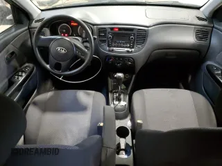 2010 Kia Rio with VIN KNADH4B37A6641845, listed as a Copart auction lot 51861215 with 163,894 mi miles and Salvage Title. Bid and sale history available at DreamBid. Image 8.