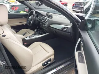 2016 BMW 2 Series 228i xDrive with VIN WBA1L9C5XGV767324, listed as a IAAI auction lot 41795604 with 133,276 mi miles. Bid and sale history available at carsss.com. Image 5.