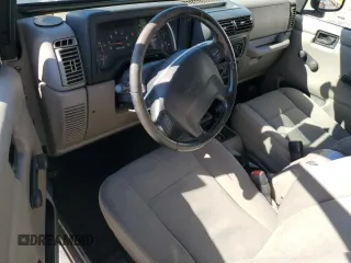 2004 Jeep Wrangler Sahara с VIN 1J4FA59S04P717093, выставлен на аукционе Copart как лот 64961095 с пробегом 151 944 миль миль и На запчасти • Non repairable. История ставок и продаж доступна на DreamBid. Изображение 8.