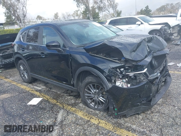 2021 Mazda CX-5 Sport with VIN JM3KFABM1M0356760, listed as a IAAI auction lot 39131600 with 1 mi miles. Bid and sale history available at carsss.com. Image 1.