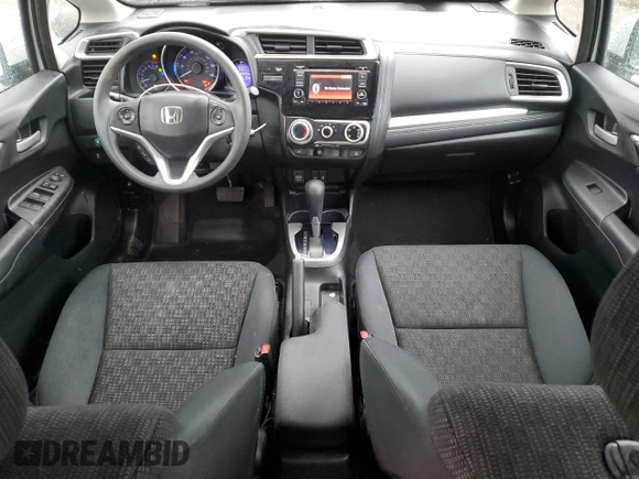 2015 Honda Fit LX with VIN 3HGGK5H57FM722000, listed as a Copart auction lot 57331455 with 140,546 mi miles and Salvage title. Bid and sale history available at DreamBid. Image 8.