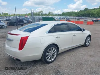 2013 Cadillac XTS Luxury with VIN 2G61P5S34D9138319, listed as a IAAI auction lot 42626756 with 88,743 mi miles and . Bid and sale history available at DreamBid. Image 4.