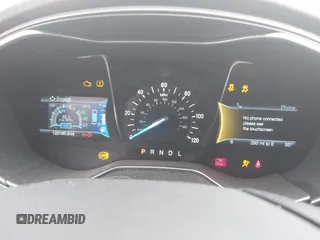 2015 Ford Fusion SE Hybrid with VIN 3FA6P0LU1FR289246, listed as a IAAI auction lot 41733229 with 125,195 mi miles. Bid and sale history available at carsss.com. Image 7.