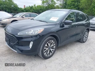 2020 Ford Escape Titanium with VIN 1FMCU9J97LUA35212, listed as a IAAI auction lot 42347274 with 50,419 mi miles and . Bid and sale history available at DreamBid. Image 2.