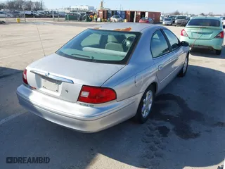 2003 Mercury Sable GS with VIN 1MEFM50U23A618707, listed as a IAAI auction lot 41472629 with 172,377 mi miles. Bid and sale history available at carsss.com. Image 4.