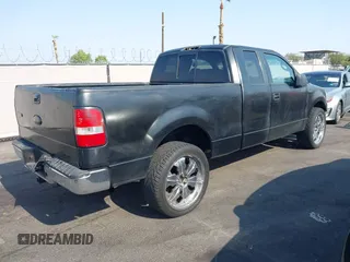 2007 Ford F-150 XLT z VIN 1FTPX14V67KD12229, wystawiony jako IAAI lot #42749433 z przebiegiem 156 168 mil mil oraz . Historia ofert i sprzedaży dostępna na DreamBid. Obrazek 4.