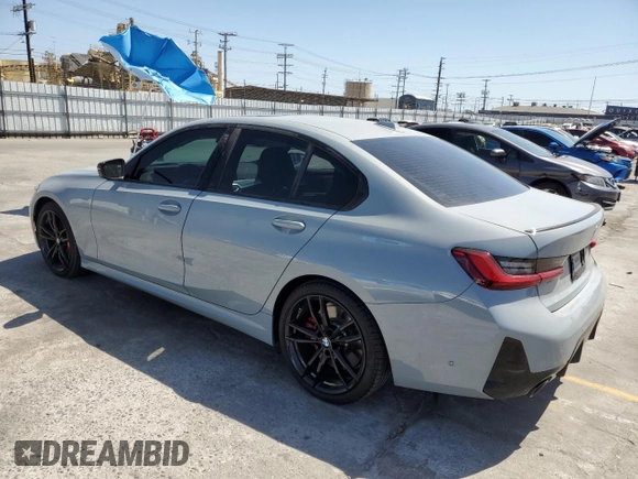 2023 BMW 3 Series 330i with VIN 3MW69FF00P8D52700, listed as a Copart auction lot 61629485 with 12,007 mi miles and Salvage title. Bid and sale history available at DreamBid. Image 2.