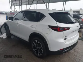2023 Mazda CX-5 2.5 S Premium Package with VIN JM3KFBDM7P0165562, listed as a IAAI auction lot 41458088 with 35,168 mi miles. Bid and sale history available at carsss.com. Image 3.