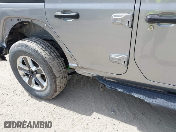 2018 Jeep Wrangler Unlimited Sahara with VIN 1C4HJXEG4JW141540, listed as a IAAI auction lot 42148402 with 43,909 mi miles and . Bid and sale history available at DreamBid. Image 17.