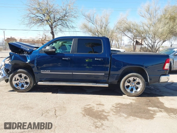 2019 Ram 1500 Big Horn z VIN 1C6RREFT4KN769061, wystawiony jako IAAI lot #41356744 z przebiegiem Nie podano mil oraz . Historia ofert i sprzedaży dostępna na DreamBid. Obrazek 14.