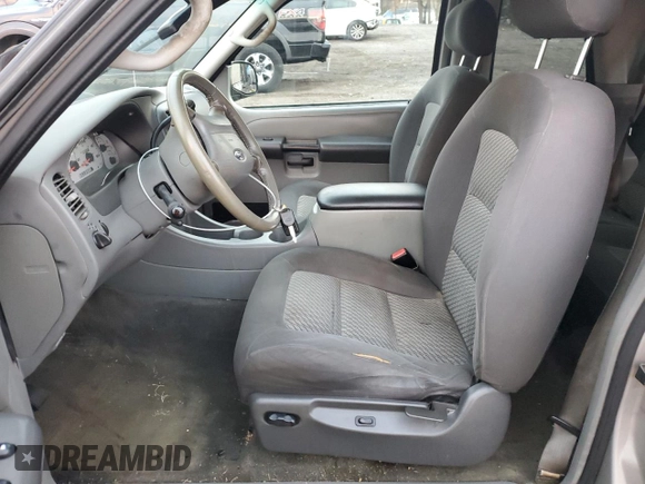 2003 Ford Explorer Sport XLS with VIN 1FMZU70E43UA37366, listed as a Copart auction lot 80890904 with 252,783 mi miles and Salvage title. Bid and sale history available at DreamBid. Image 7.
