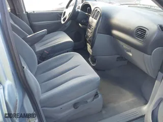 2006 Dodge Caravan SXT with VIN 1D4GP45R86B577853, listed as a IAAI auction lot 41695240 with 167,391 mi miles. Bid and sale history available at carsss.com. Image 5.