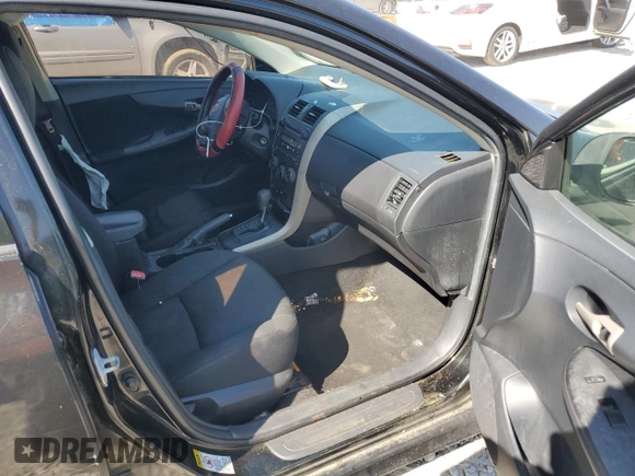 2009 Toyota Corolla with VIN 2T1BU40E19C098930, listed as a Copart auction lot 52001705 with 203,305 mi miles and Salvage Title. Bid and sale history available at carsss.com. Image 8.