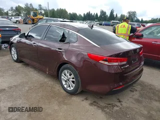 2016 Kia Optima LX with VIN 5XXGT4L39GG088686, listed as a IAAI auction lot 42531803 with 66,521 mi miles and . Bid and sale history available at DreamBid. Image 3.