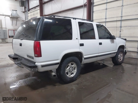 1996 Chevrolet Tahoe with VIN 1GNEK13R5TJ341299, listed as a IAAI auction lot 41713489 with 251,990 mi miles. Bid and sale history available at carsss.com. Image 4.