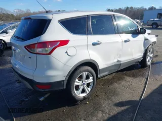 2015 Ford Escape SE with VIN 1FMCU0G70FUA46980, listed as a IAAI auction lot 41213582 with 246,343 mi miles. Bid and sale history available at carsss.com. Image 4.