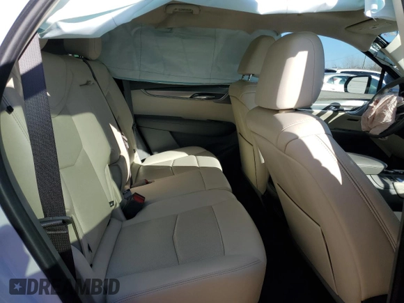 2021 Cadillac XT5 FWD Premium Luxury with VIN 1GYKNCRS0MZ198199, listed as a Copart auction lot 83595494 with 27,923 mi miles and Salvage Title. Bid and sale history available at carsss.com. Image 11.